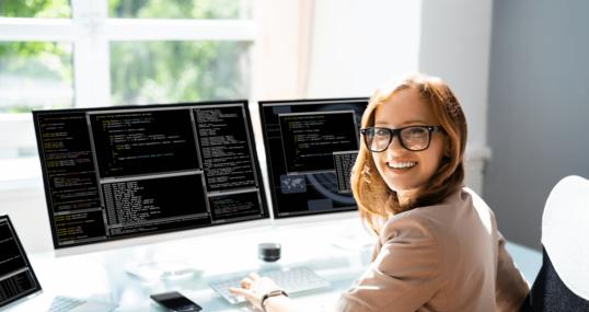 Programmer Woman Coding On Computer