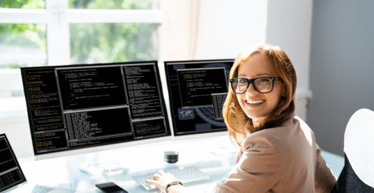 Programmer Woman Coding On Computer