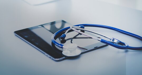 stethoscope on computer keyboard