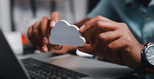 Businessmen use laptops to secure computing through cloud storage for digital business and cloud data processing management. Optimizing online business customer service