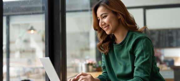 Asian woman working with laptop