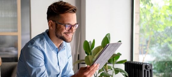 Young Man holding digital tablet